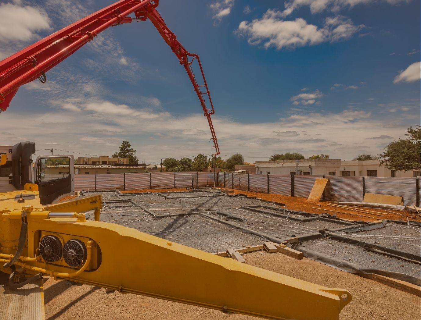 Concrete pumping equipment placing concrete on site